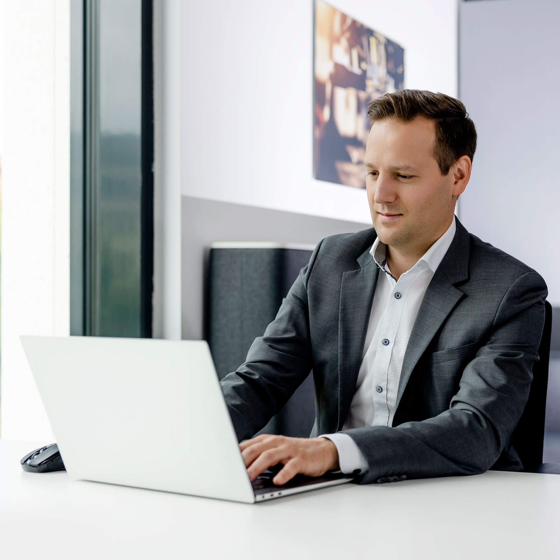 A lawyer from activeMind.legal examines a client's request in the field of data protection law