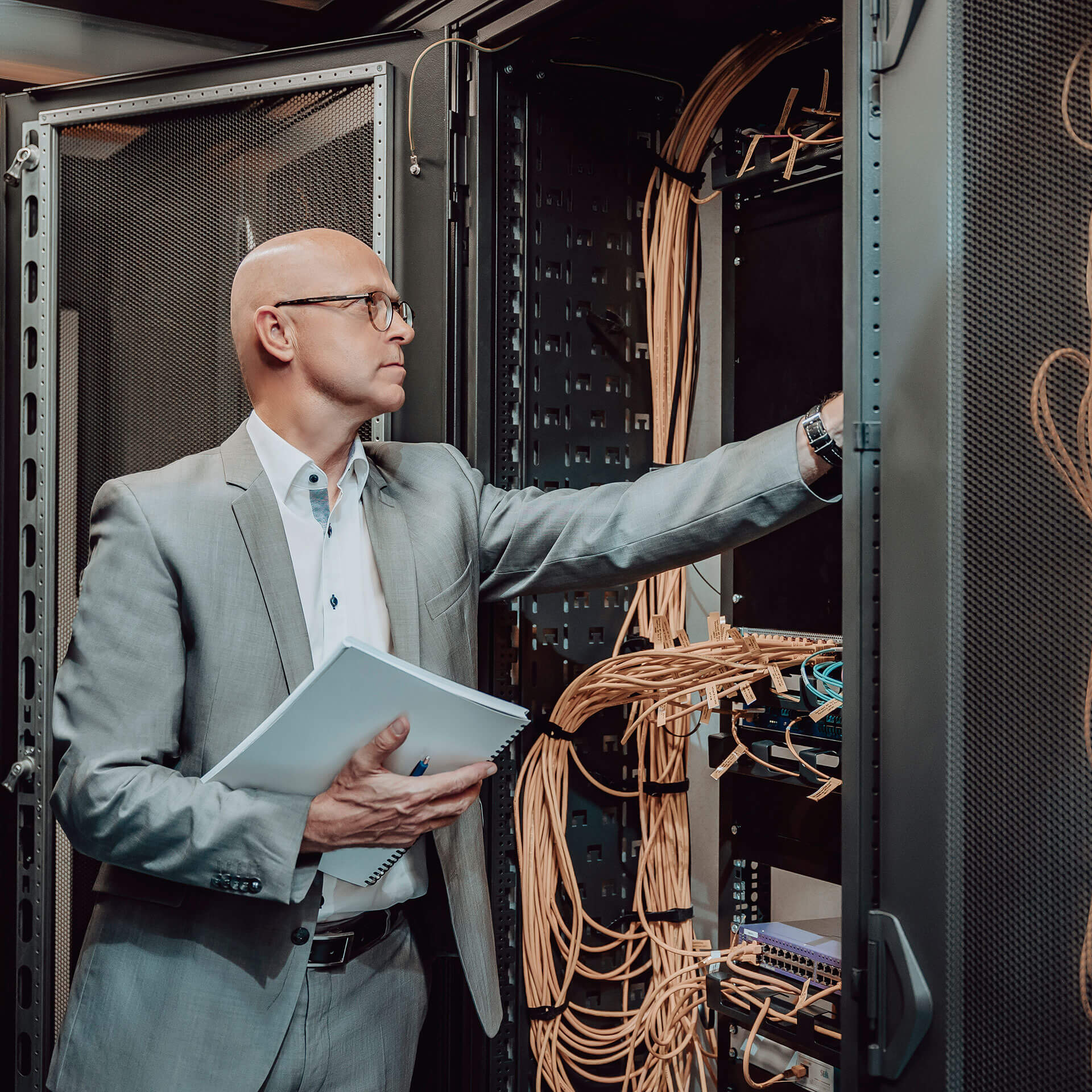 A security expert from activeMind.legal checks the setup of a server